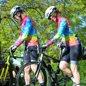 Man on a MTB wearing MTB shorts and Flandrian Long Sleeve jersey with the Belgium stripes