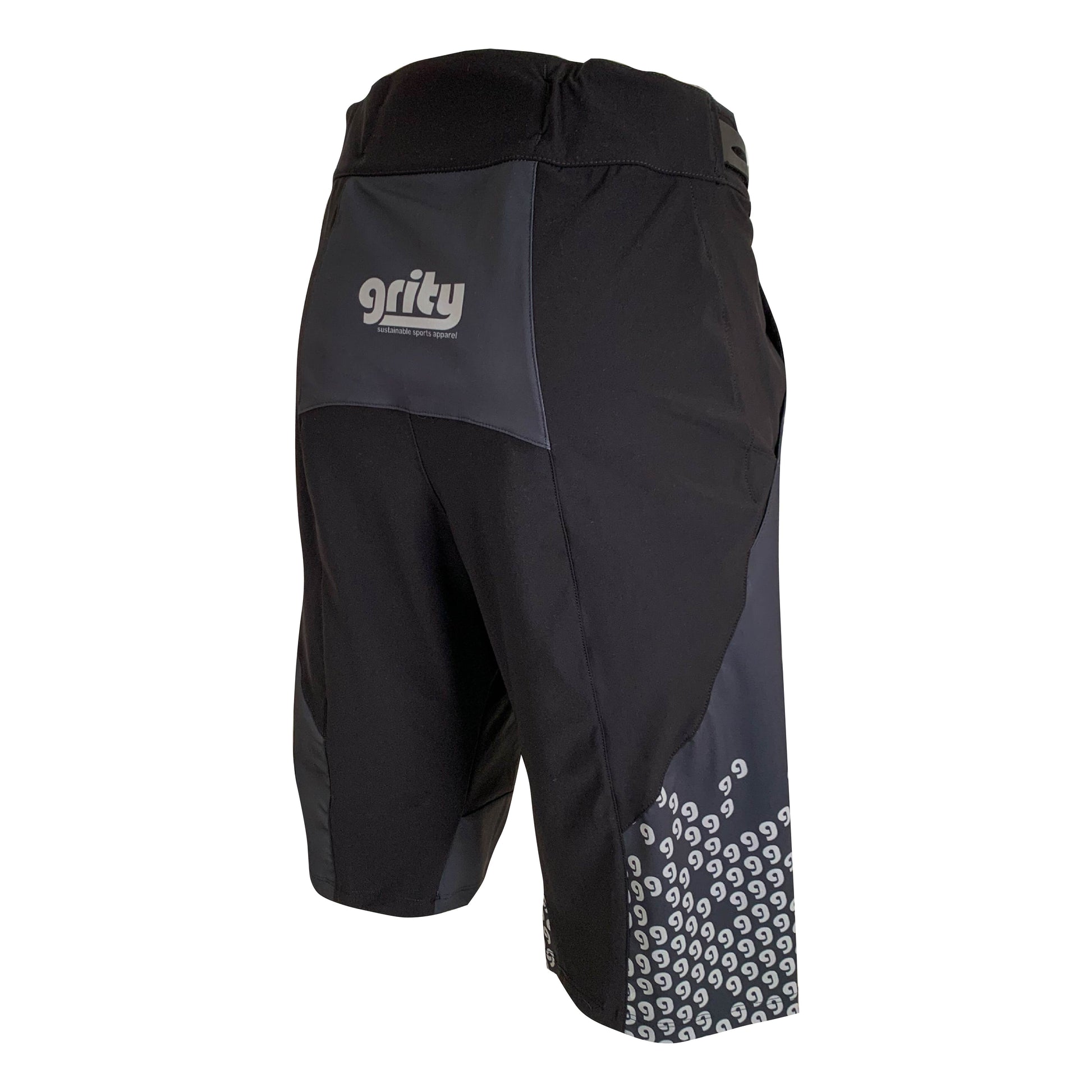 Rear view Mountain bike baggy shorts, charcoal grey with a ggg pattern on the right cuff